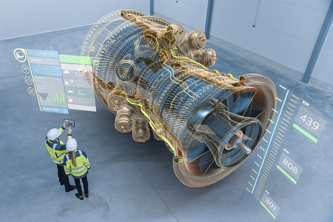 Zwei Ingenieure stehen und sprechen in einer Fabrikwerkstatt mit Augmented Reality 3D-Modell eines riesigen Turbinenmotors