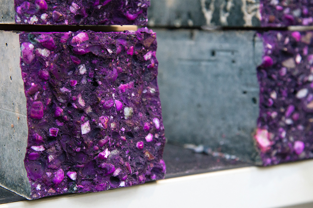 Assessment of the carbonation resistance of alkali-activated concretes by spraying with phenolphthalein. The colouring of the complete fracture surface demonstrates that significant carbonation has not yet taken place.  Assessment of the carbonation resistance of alkali-activated concretes by spraying with phenolphthalein. The colouring of the complete fracture surface demonstrates that significant carbonation has not yet taken place.