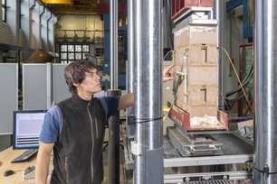Earth masonry sample in the test facility Earth masonry sample in the test facility