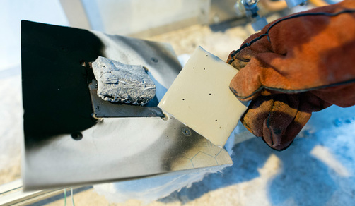 Two ceramic plates. The one on the left is inflated following the fire test. Two ceramic plates. The one on the left is inflated following the fire test.